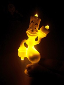 Lumiere Happy Meal Toy lit up